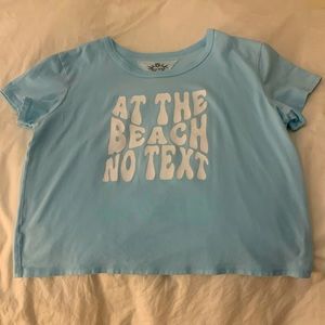 AT THE BEACH NO TEXT blue t-shirt in size youth 12.